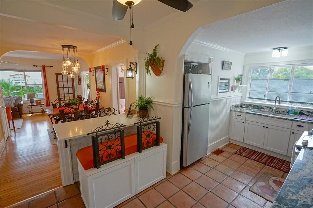 229 East 6th Avenue Mount Dora, FL 32757 - Photo 16 of 65 a kitchen with stainless steel appliances granite countertop a refrigerator a stove and a sink