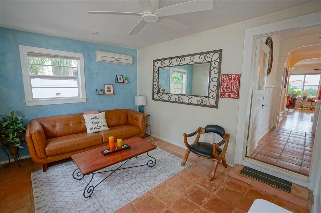 229 East 6th Avenue Mount Dora, FL 32757 - Photo 17 of 65 a living room with furniture and a rug