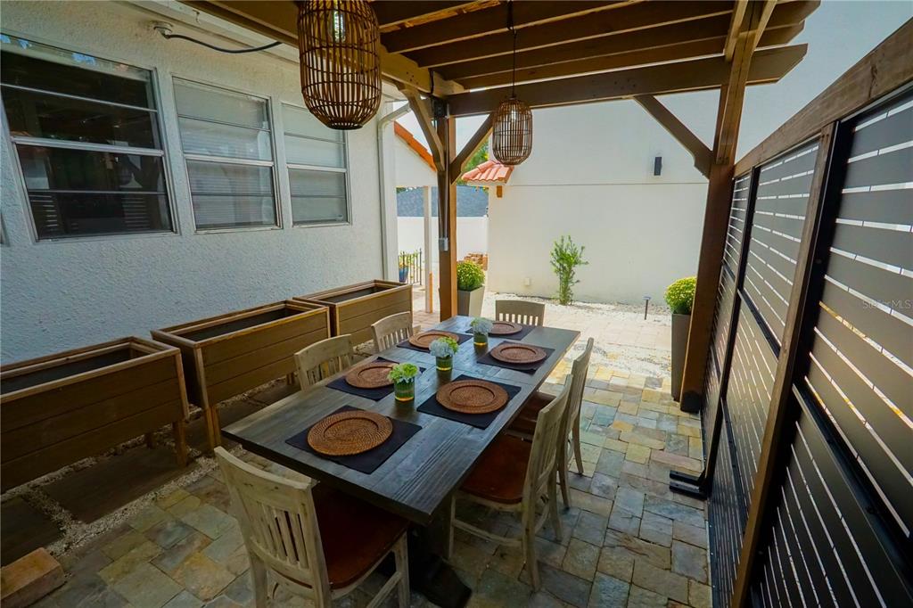 229 East 6th Avenue Mount Dora, FL 32757 - Photo 31 of 65 a dining room with furniture and a window