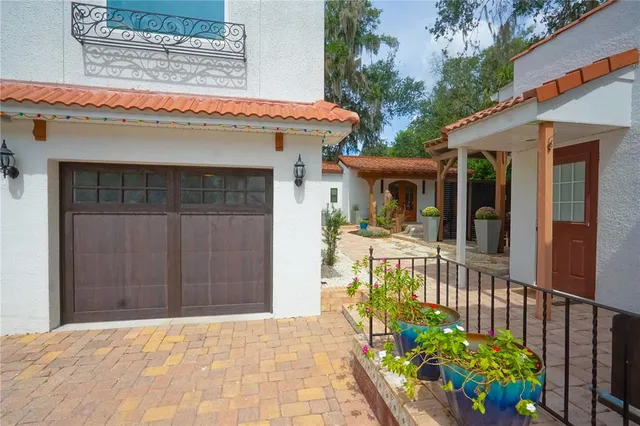 a kitchen with stainless steel appliances a refrigerator and cabinets