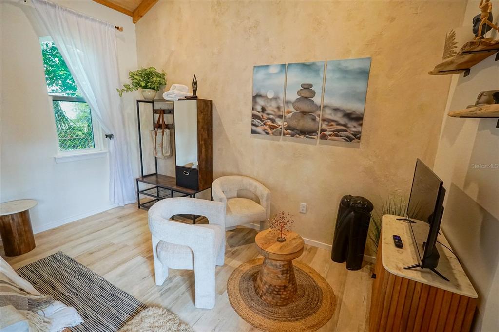 229 East 6th Avenue Mount Dora, FL 32757 - Photo 57 of 65 a living room with furniture and a window