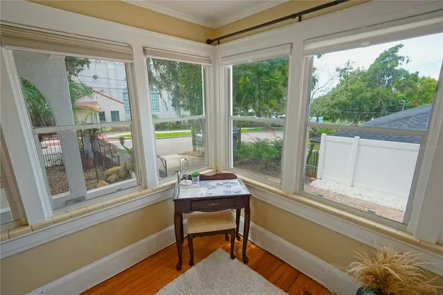 a room with furniture and a window