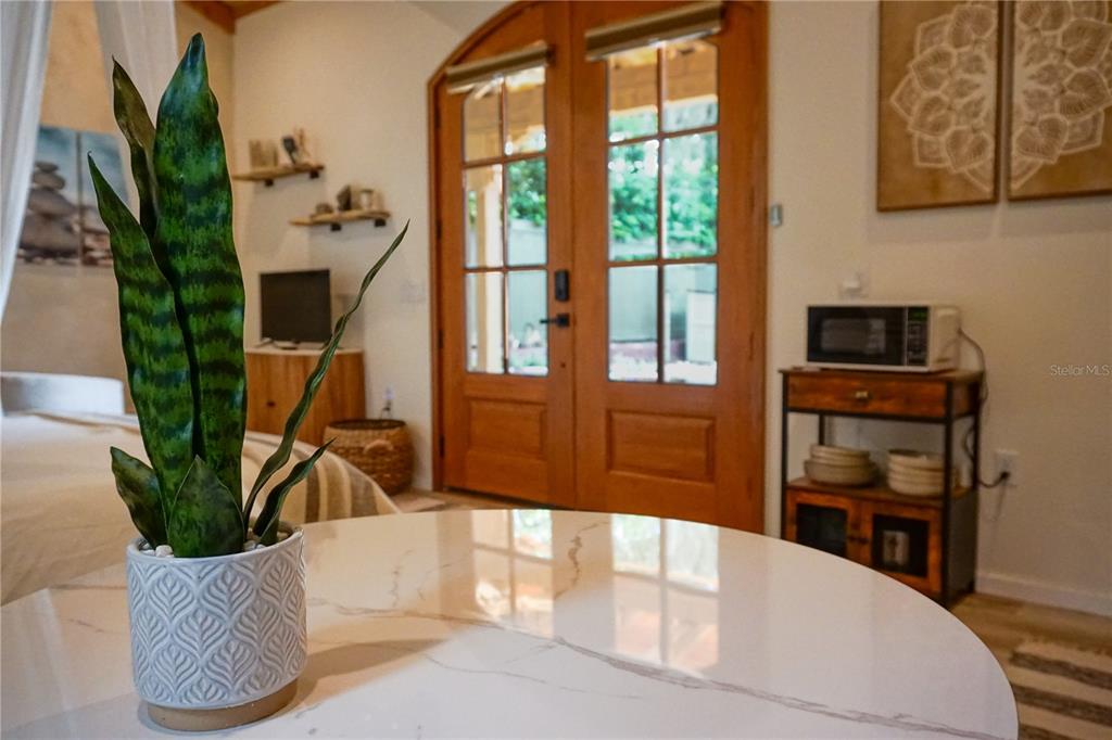 229 East 6th Avenue Mount Dora, FL 32757 - Photo 63 of 65 a view of a livingroom with furniture window and wooden floor