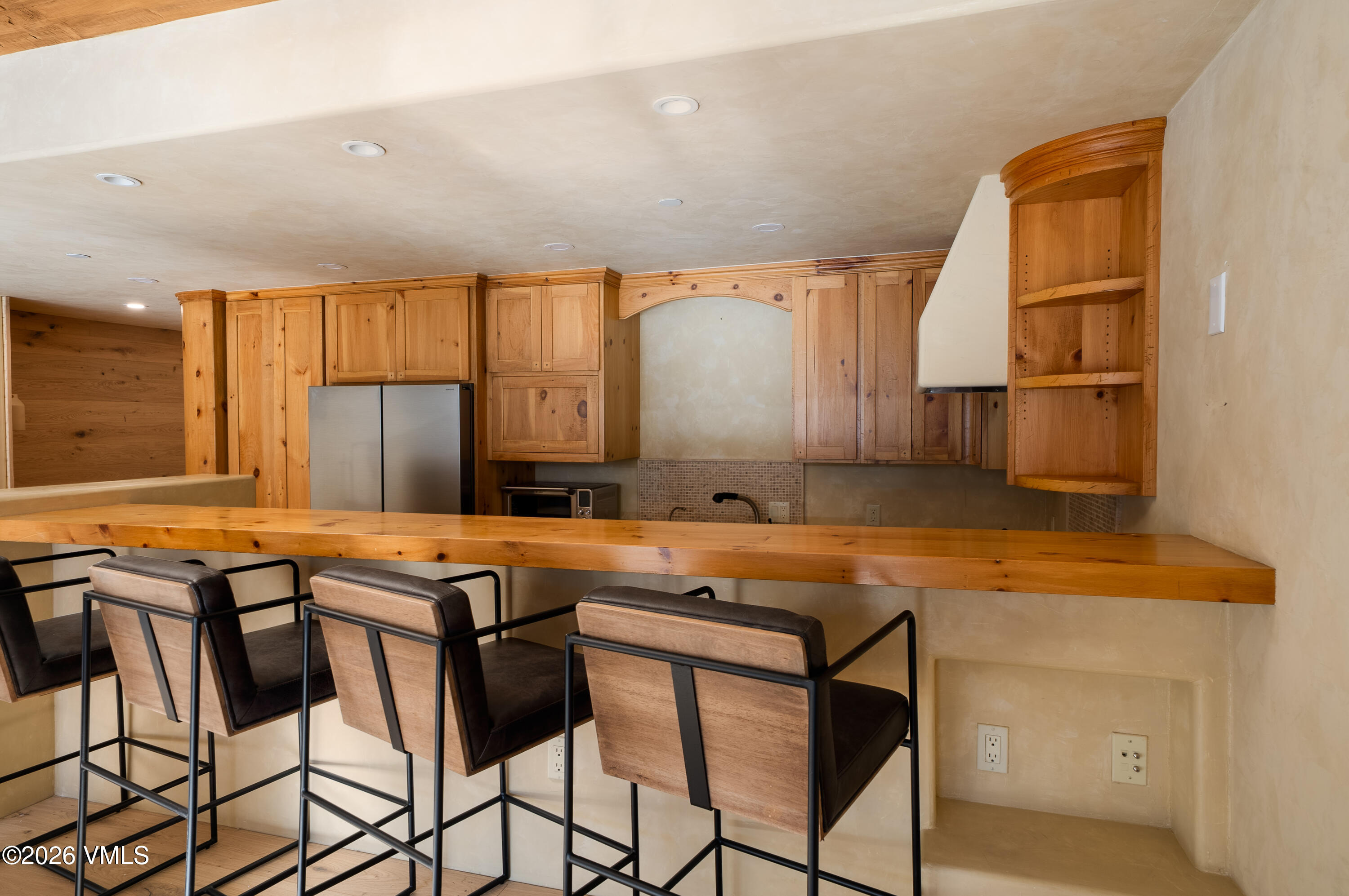 120 Willow Bridge Road, Unit 3G Vail, CO 81657 - Photo 4 of 13 Bar Seating in the Kitchen