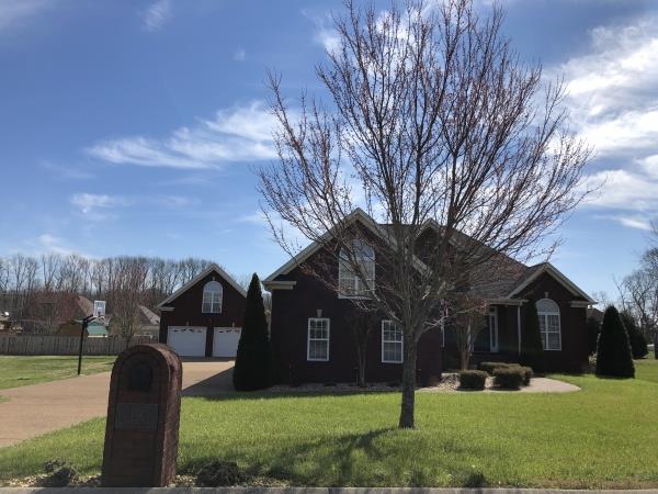 702 Heritage Road Lebanon, TN 37087 - Photo 1 of 25 a front view of house with yard and green space