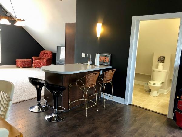 702 Heritage Road Lebanon, TN 37087 - Photo 24 of 25 a view of a dining room with furniture and a chandelier