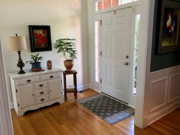702 Heritage Road Lebanon, TN 37087 - Photo 8 of 25 a room with painting and a potted plant