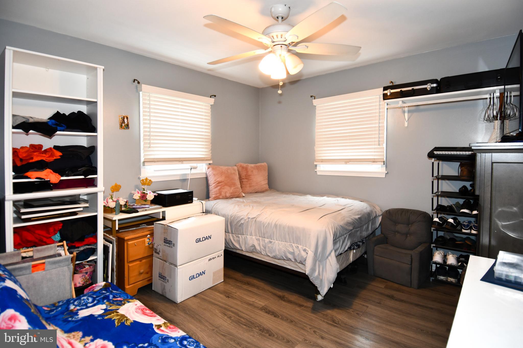 6114 Osborn Road Landover, MD 20785 - Photo 15 of 38 a bedroom with a bed and a window