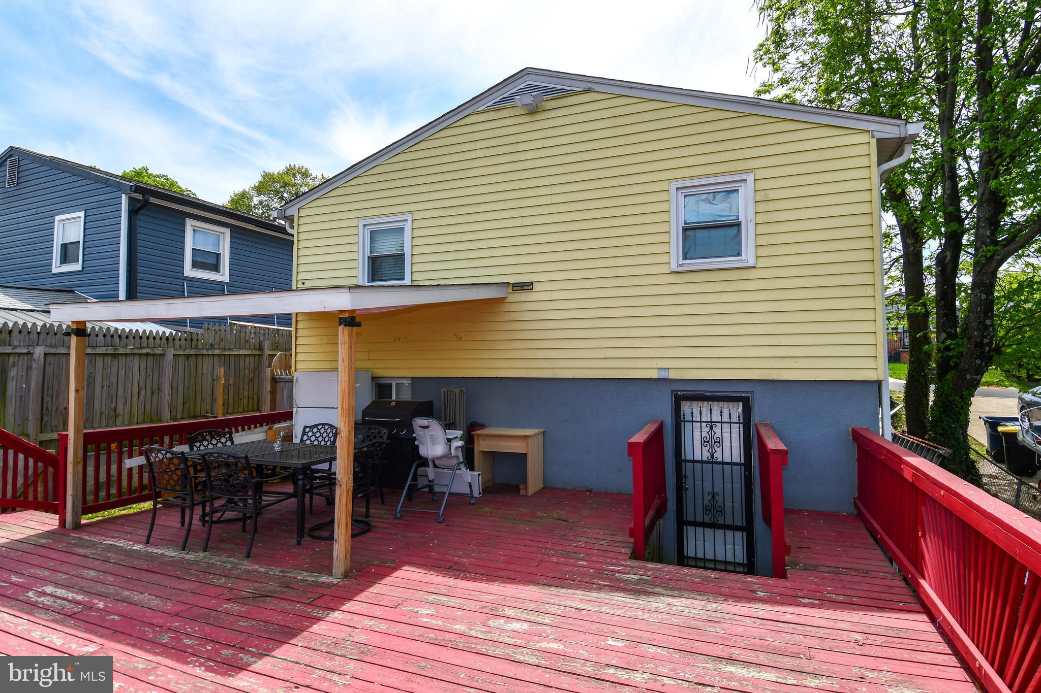 6114 Osborn Road Landover, MD 20785 - Photo 2 of 38 a view of a dinning table and chairs in patio of the house