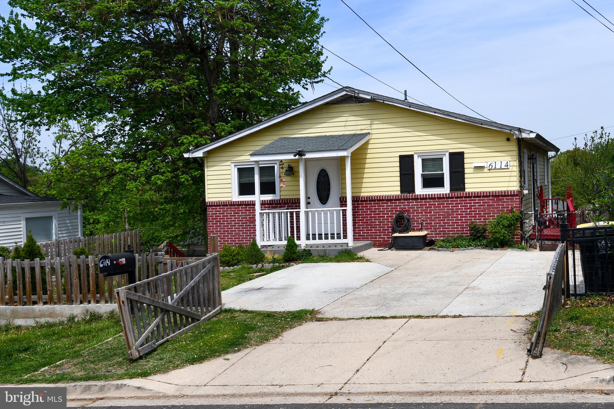 6114 Osborn Road Landover, MD 20785 - Photo 3 of 38 a front view of house and yard with seating space