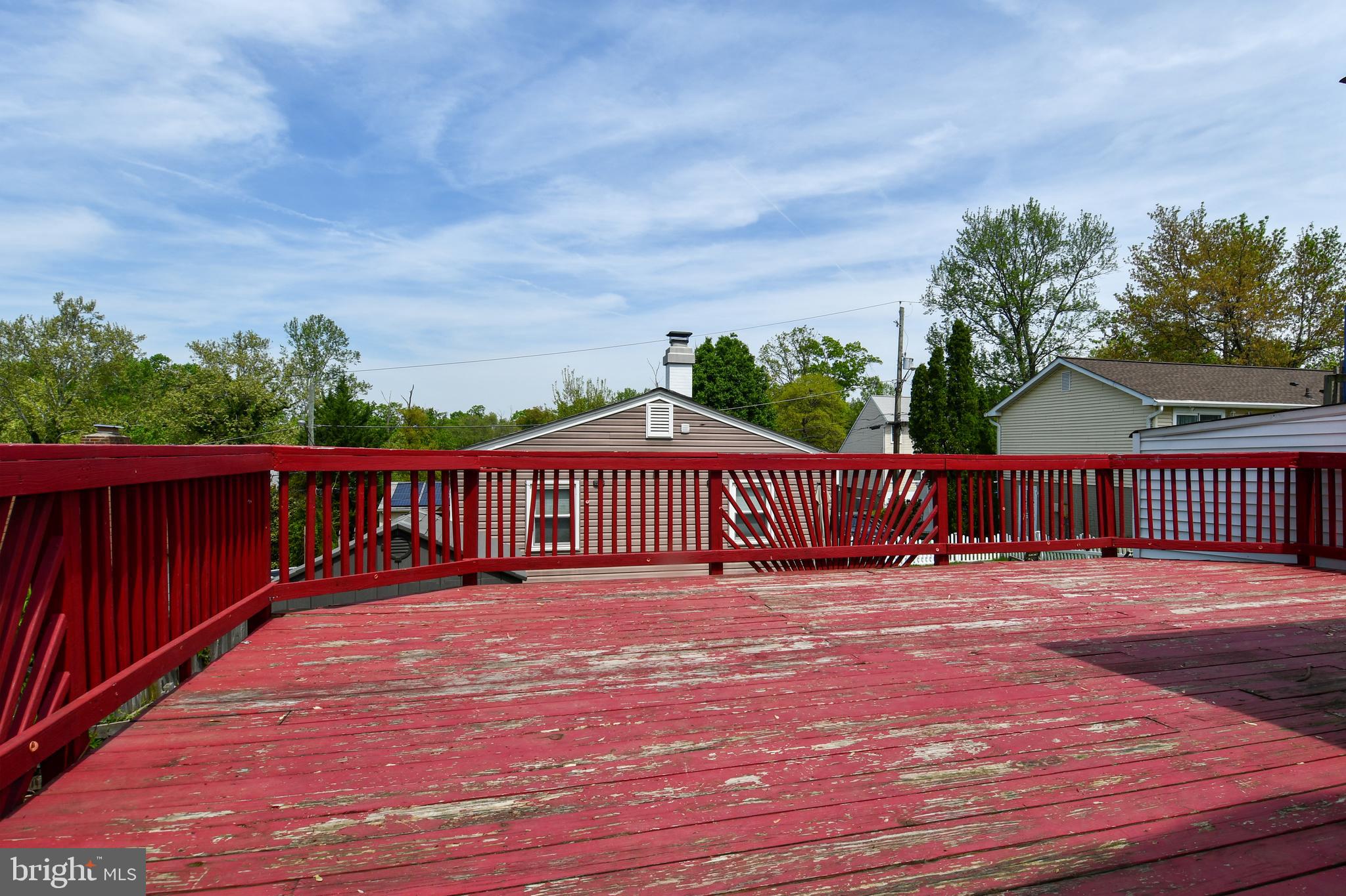 6114 Osborn Road Landover, MD 20785 - Photo 34 of 38 a view of a deck with a yard
