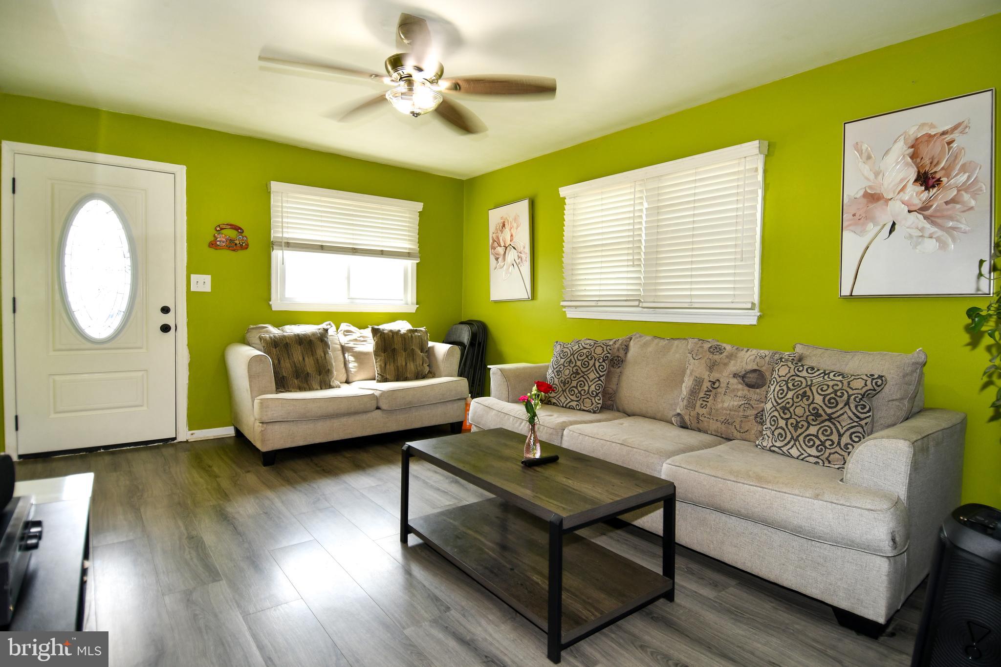 6114 Osborn Road Landover, MD 20785 - Photo 4 of 38 a living room with furniture and a large window