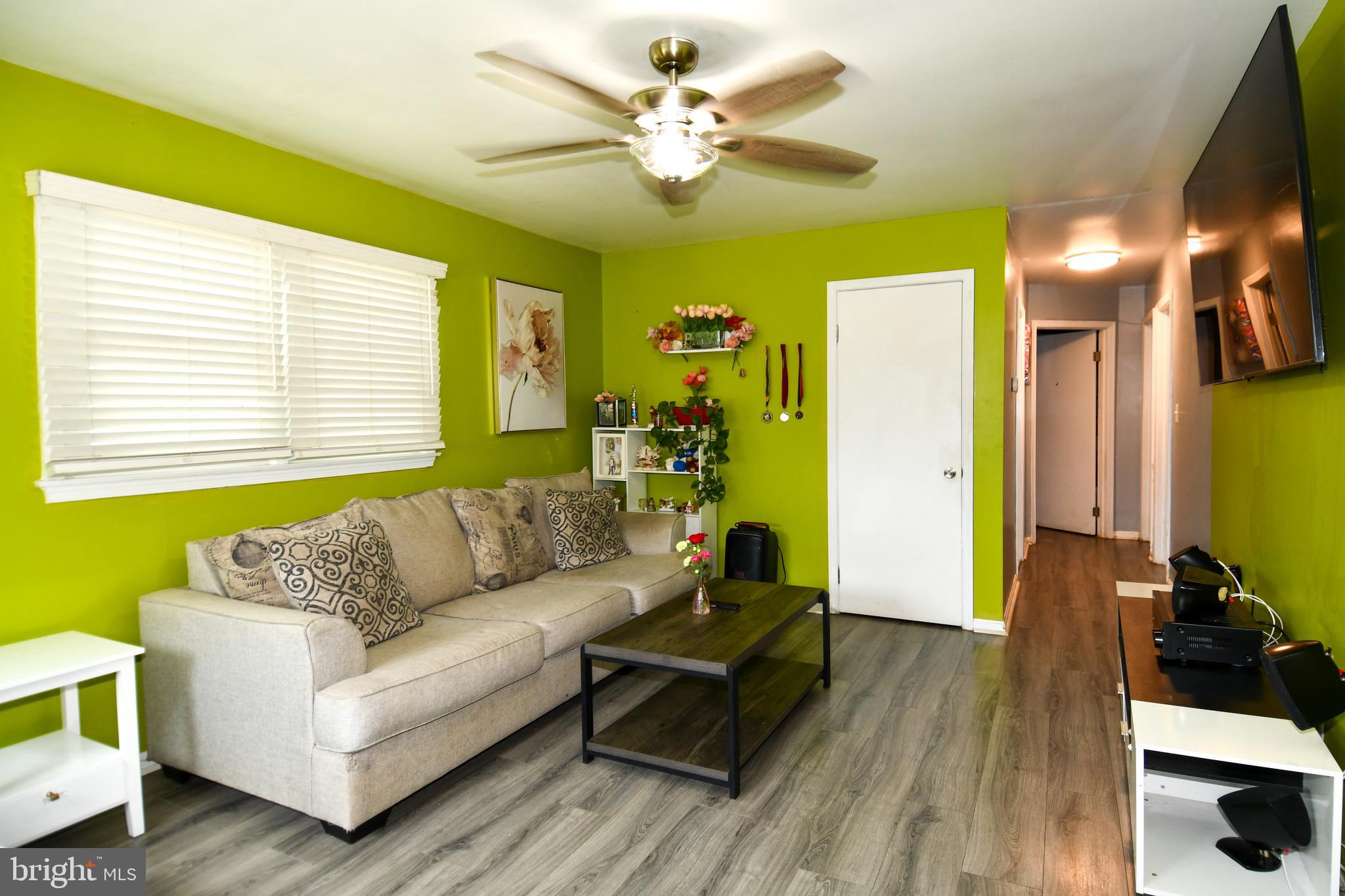 6114 Osborn Road Landover, MD 20785 - Photo 5 of 38 a living room with furniture and a large window