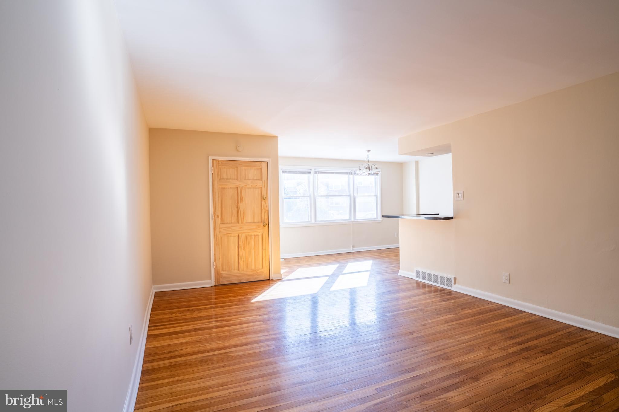 3717 Mimi Circle Philadelphia, PA 19131 - Photo 5 of 12 a view of empty room with wooden floor and fan