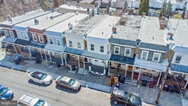 an aerial view of a building with seating space
