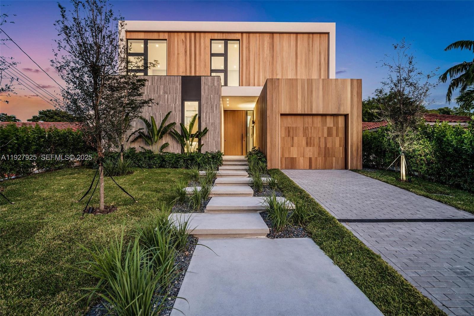 a view of a pathway with a house in front of it