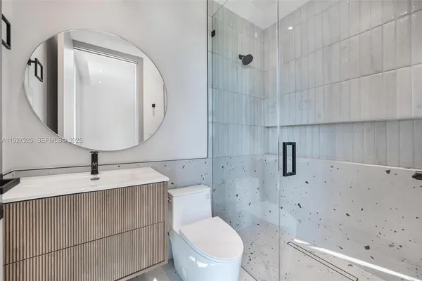a utility room with sink dryer and washer