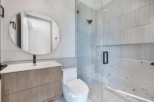 a utility room with sink dryer and washer