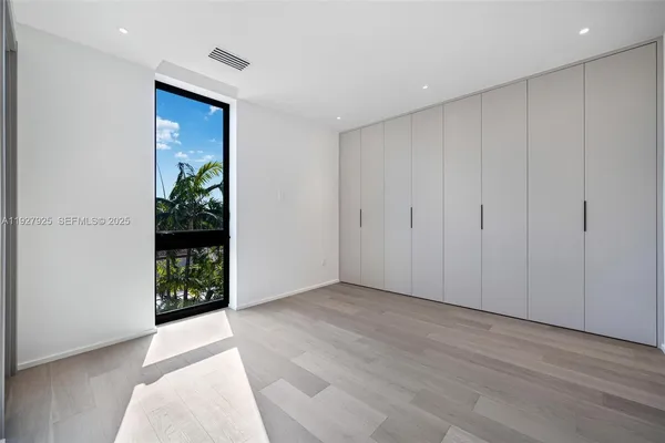 a bathroom with a sink a toilet and shower curtain