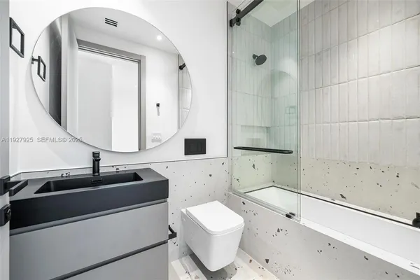 a view of a backyard with sitting area