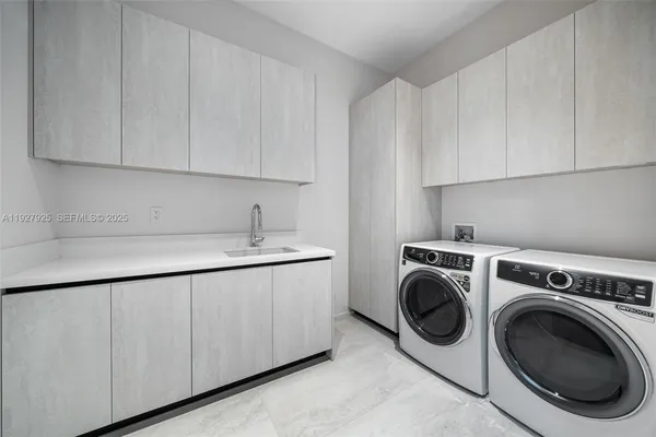a view of a chairs and table in patio