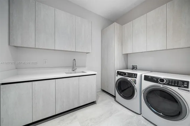 a view of a chairs and table in patio