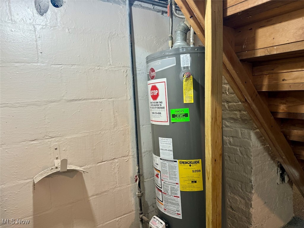 4595 Tiedeman Road Cleveland, OH 44144 - Photo 27 of 29 Utility room featuring water heater