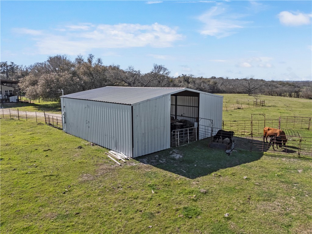 a view of a lake with a yard