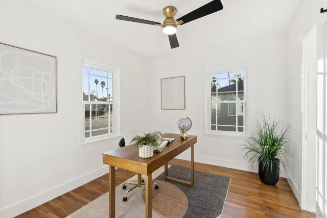 a view of a livingroom with furniture and window