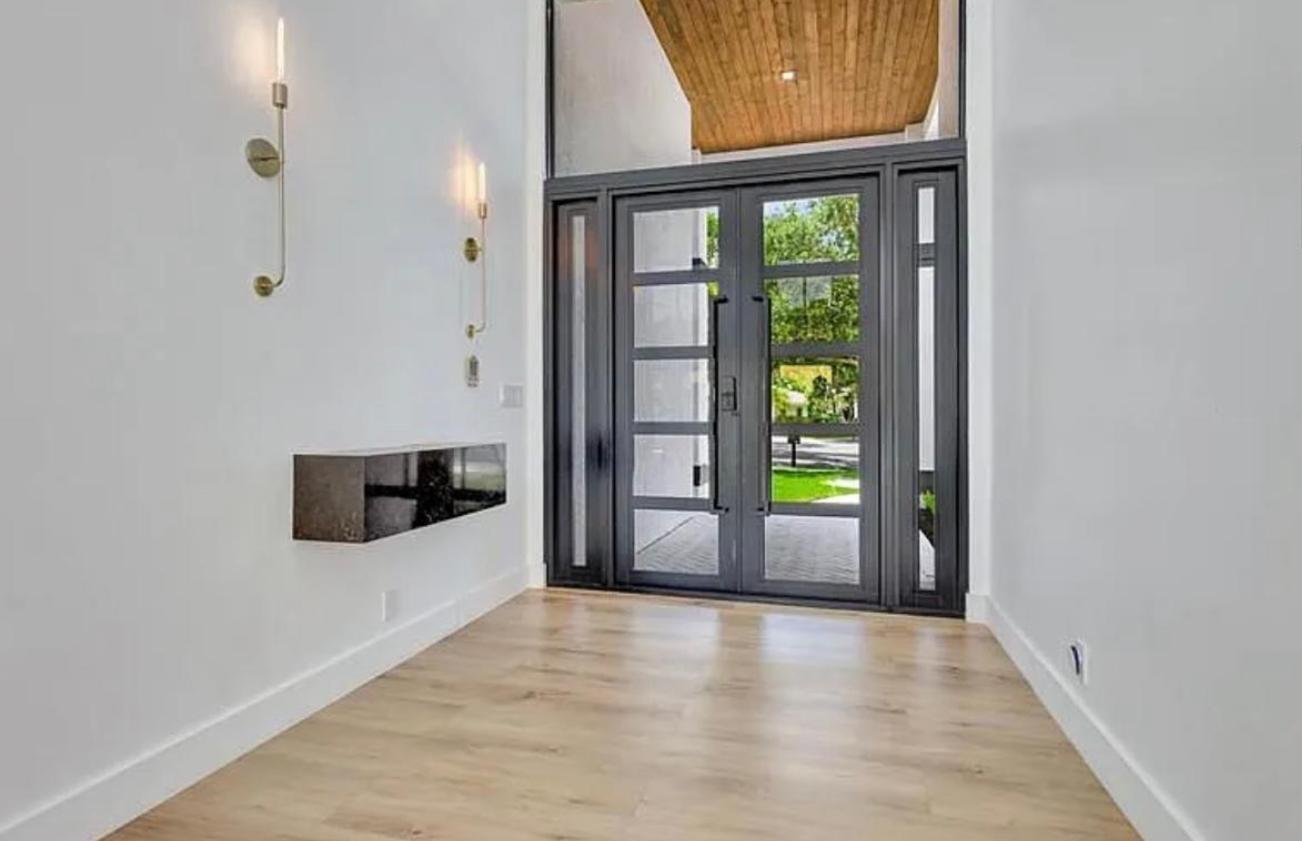 2299 Northwest 55th Street Boca Raton, FL 33496 - Photo 3 of 47 an empty room with windows