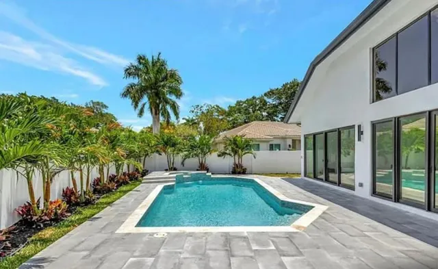 a house view with a garden space