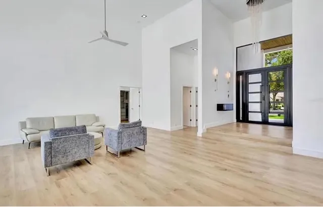 a living room with furniture and window