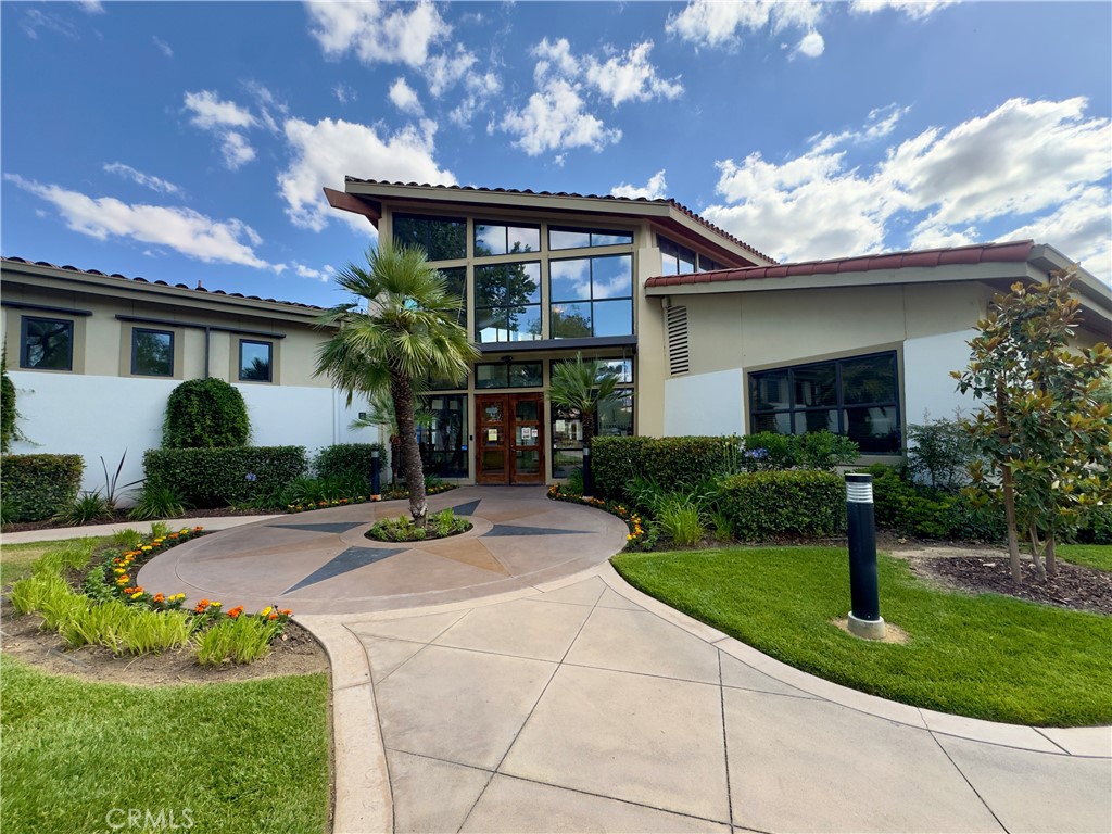 11265 Runyan Road Beaumont, CA 92223 - Photo 105 of 138 a front view of a house with a yard and outdoor seating
