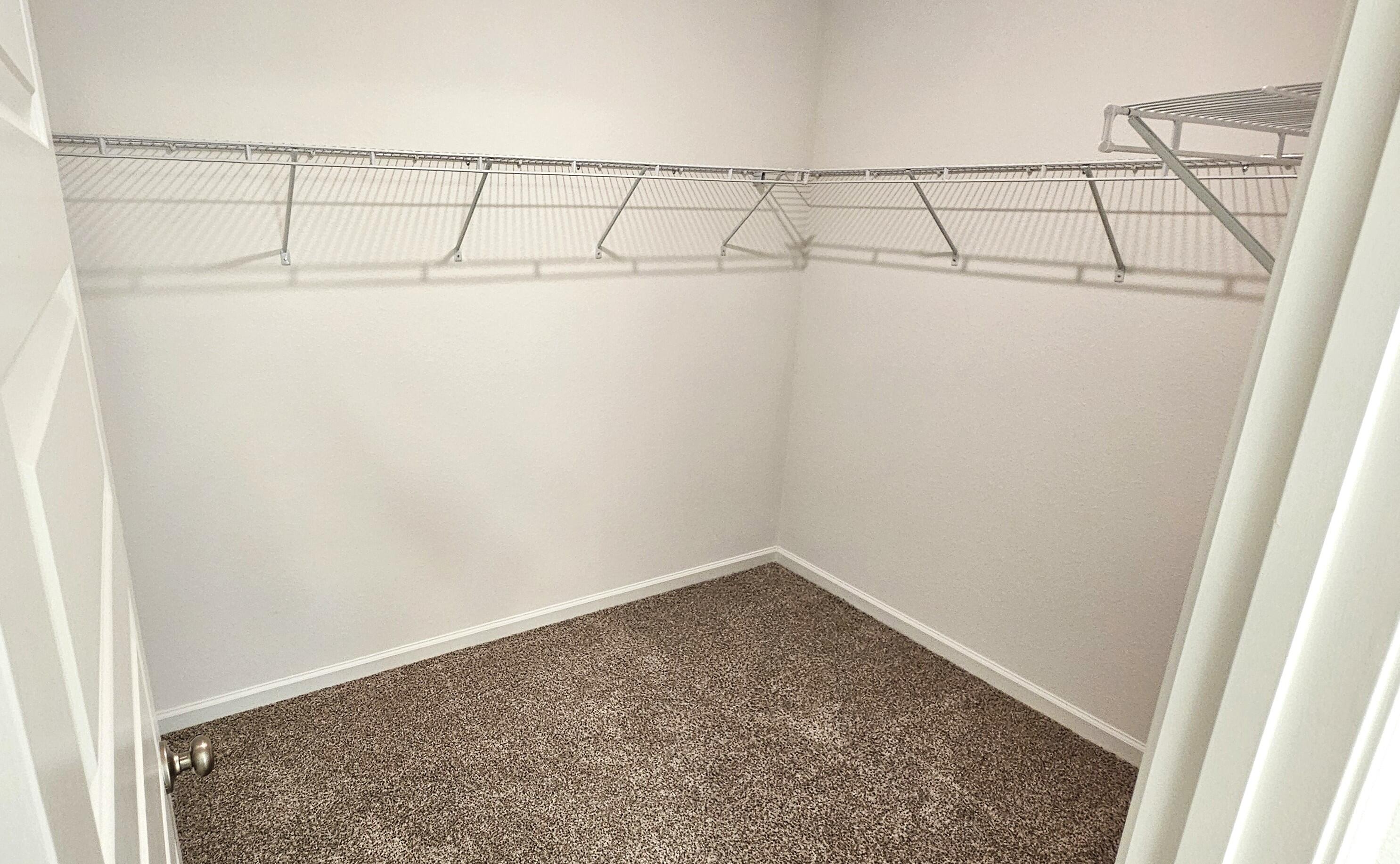 96 Sweetthorn Street Freeport, FL 32439 - Photo 11 of 18 a view of a room with racks on the wall
