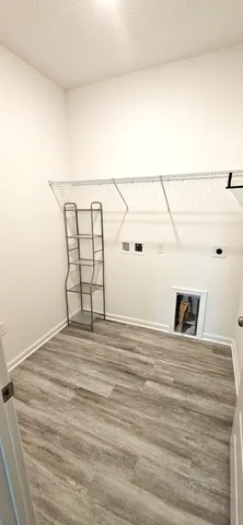 a view of a room with racks on the wall