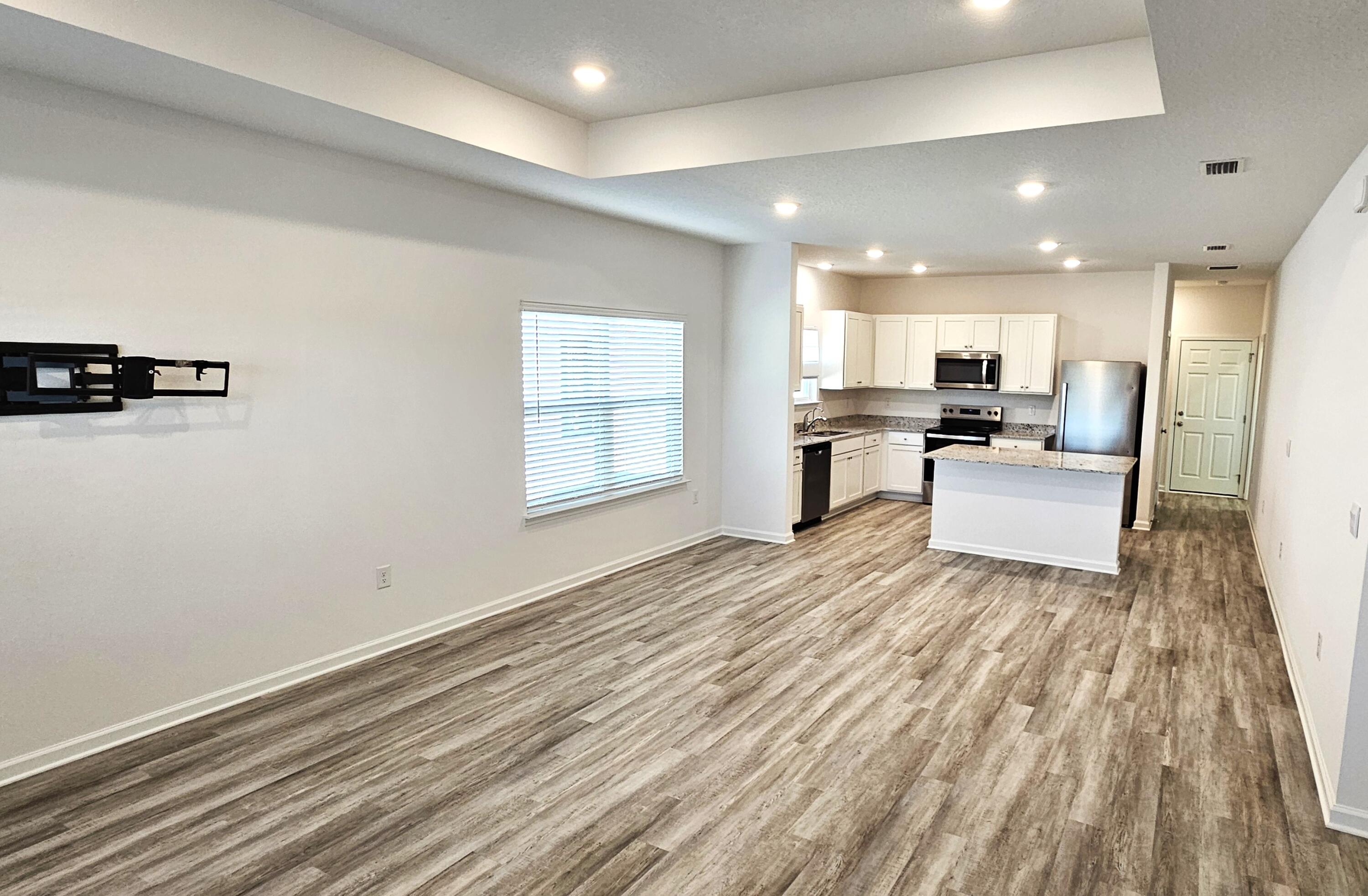 96 Sweetthorn Street Freeport, FL 32439 - Photo 5 of 18 a view of a kitchen with a sink and cabinets