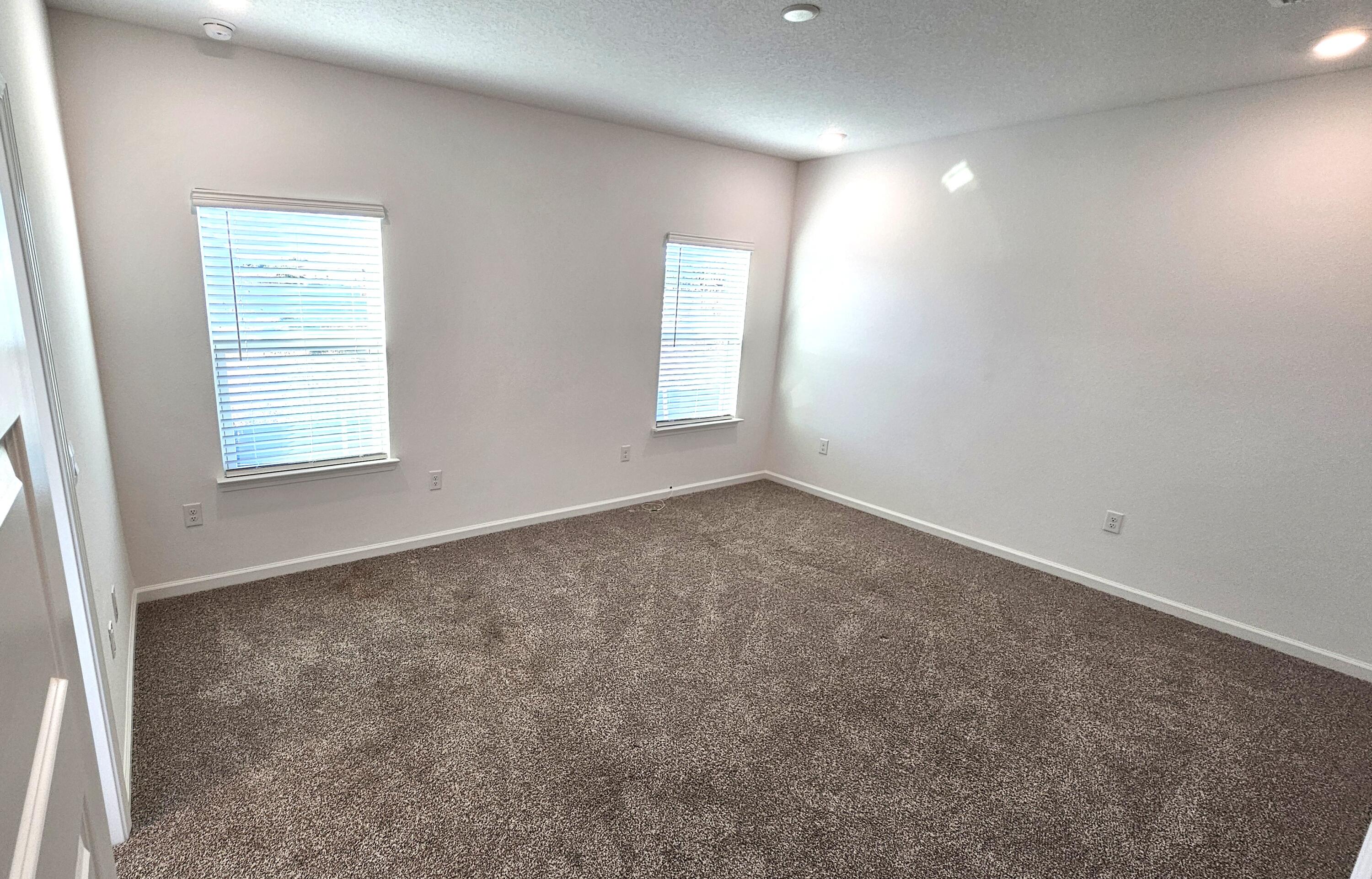 96 Sweetthorn Street Freeport, FL 32439 - Photo 6 of 18 an empty room with windows