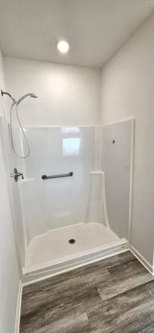 a bathroom with a bath tub