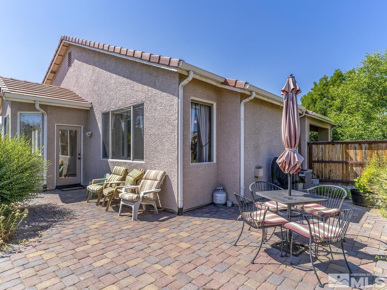 10150 Robilee Court Reno, NV 89521 - Photo 9 of 40 a view of a house with patio