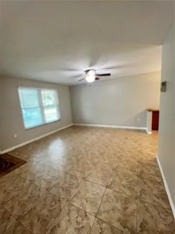 a view of an empty room and window