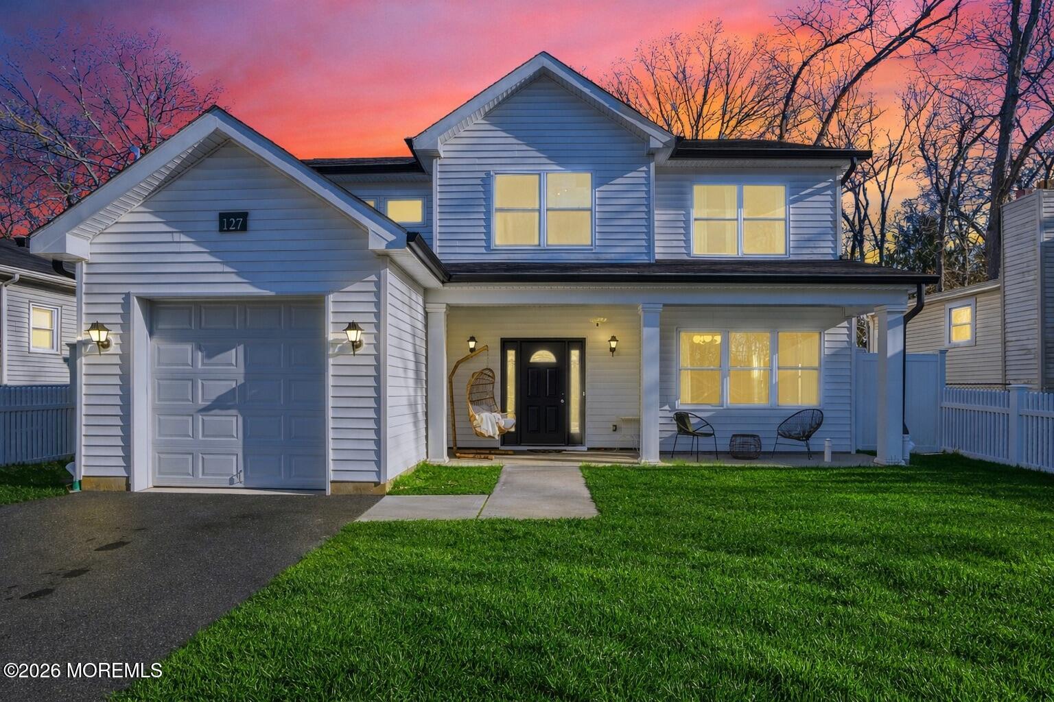 127 West 2nd Street Howell, NJ 07731 - Photo 1 of 29 a front view of a house with a yard