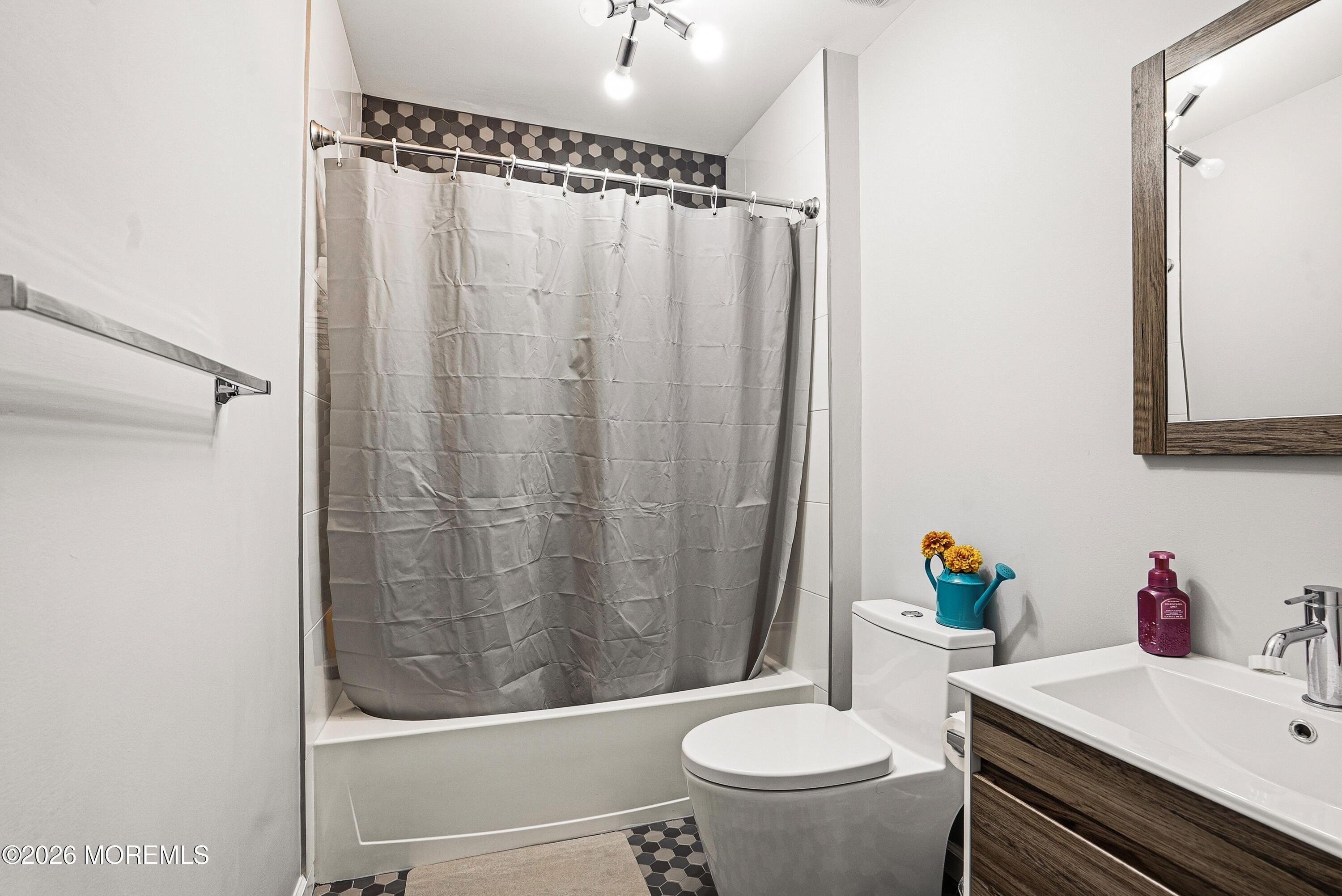127 West 2nd Street Howell, NJ 07731 - Photo 22 of 29 a bathroom with a sink toilet and shower