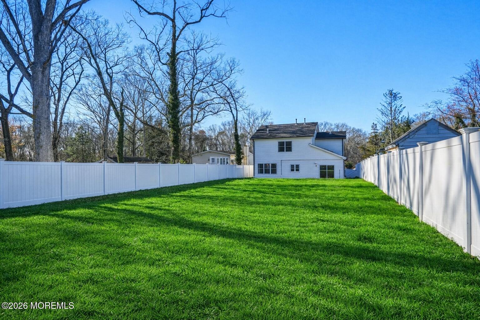 127 West 2nd Street Howell, NJ 07731 - Photo 25 of 29 a view of a house with backyard and a tree