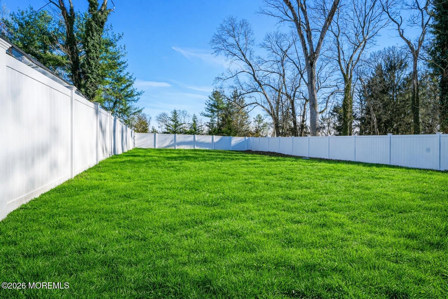 127 West 2nd Street Howell, NJ 07731 - Photo 26 of 29 a view of a backyard with large trees