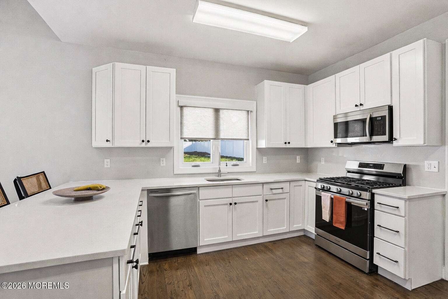 127 West 2nd Street Howell, NJ 07731 - Photo 9 of 29 a kitchen with appliances a sink and cabinets