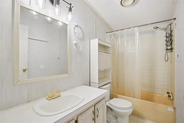 a view of empty room with windows