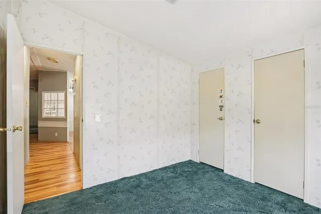 a view of an empty room and window