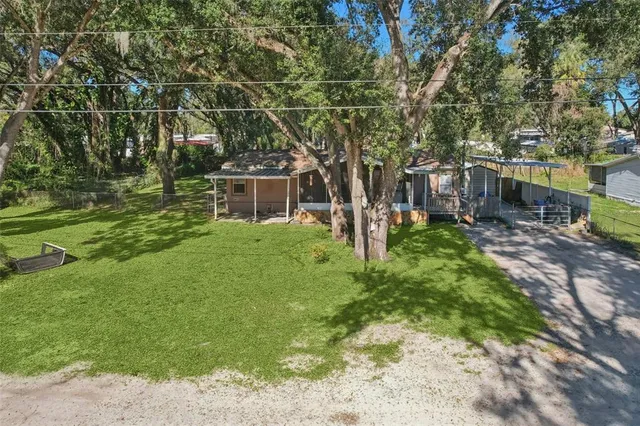 a under view of a house with a yard