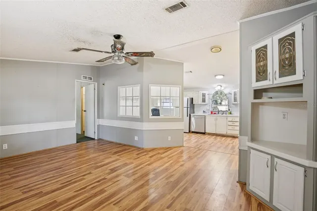 a view of a livingroom with wooden floor
