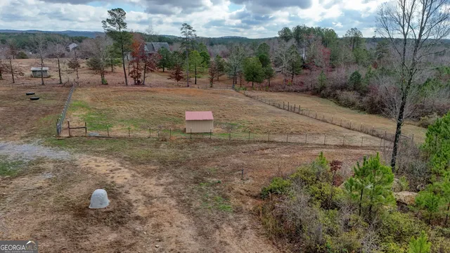 a view of a road with a building in the background